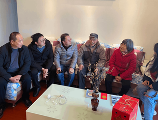 我会党支部赴江北区石马河街道开展“新春送温暖”活动