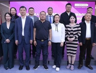 老挝最高人民检察院国际合作局宋波龙书记一行到云南省四川商会副会长单位－北京大成（昆明）律师事务所访问交流