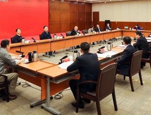 尹力调研：要求努力建设有核心竞争力的世界一流金融机构