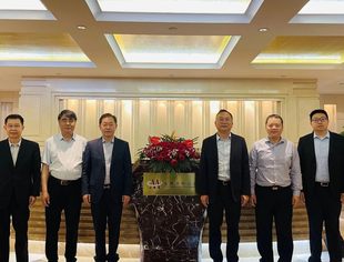 海南省工商联主席丁飞一行到访全联并购公会