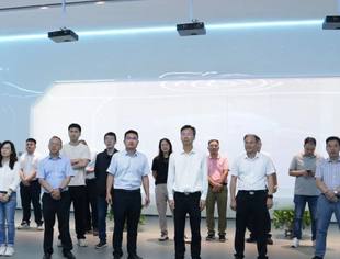 广东省江门市政协副主席李文聪一行调研我会理事单位万里扬公司