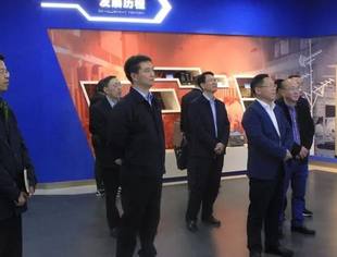 【理事单位动态】绵阳市政协副主席、经开区党工委书记兰劲一行到九洲参观座谈交流